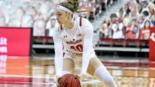 Tara Stauffacher looks to pass the ball