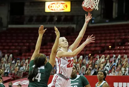 Lovisa Djurstrom drives to the basket against a Michigan State defender.