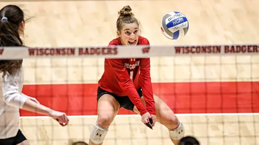 Lauren Barnes records a dig vs. Rutgers.