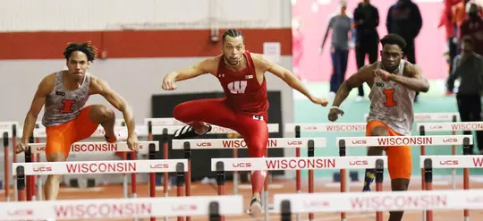 Peyton Frankenreider hurdling at UW Shell indoor track - Wisconsin men's track & field