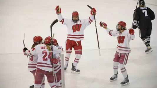 Badgers celebrate Pettet's game winning goal in the 2021 NCAA quarterfinal