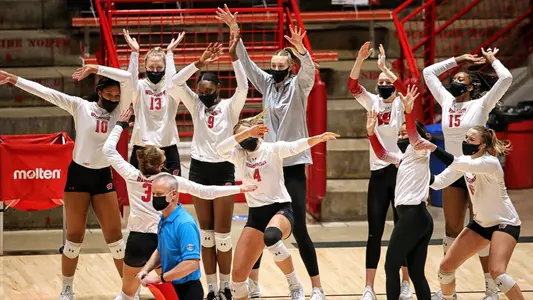 The Badger bench celebrates during a match.