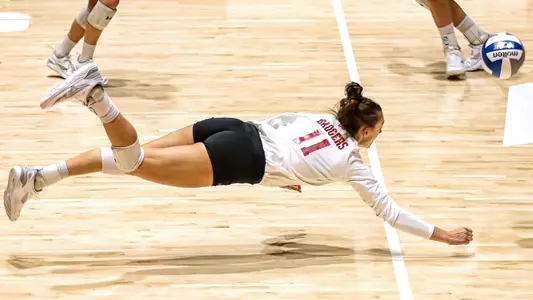 Izzy Ashburn goes all out to save a ball.