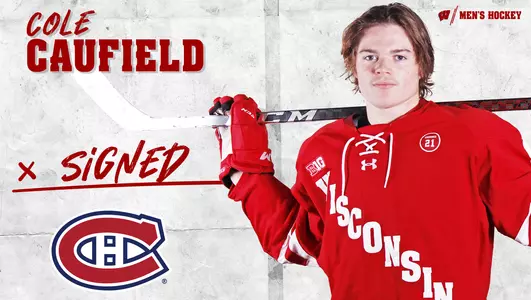Cole Caufield Signs