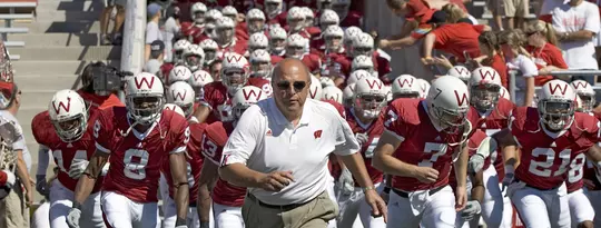 MADISON, WI - SEPTEMBER 3: Head coach Barry Alvarez of the Wisconsin Badgers and his team take the field prior to the game against the Bowling Green Falcons at Camp Randall Stadium on September 3, 2005 in Madison, Wisconsin. The Badgers beat the Falcons 56-42. Photo by David Stluka.