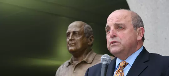 Wisconsin director of athletics Barry Alvarez speaks to crowd at ceremony unveiling a statue of him at Camp Randall Stadium