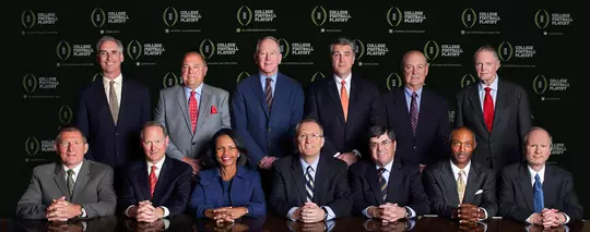 Barry Alvarez in group photo for inaugural College Football Playoff Committee. Alvarez is standing back row, 2nd from left.