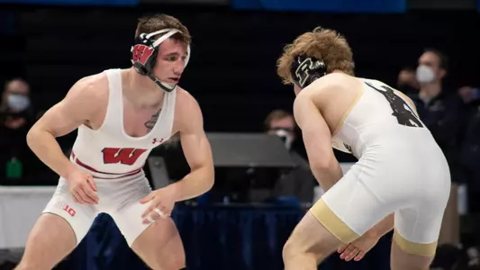 Kyle Burwick wins 4-3 decision to place fifth at 2021 Big Ten Championships against Purdue's Jacob Rundell in 133-pound match. Burwick also qualified for the NCAA Tournament for the first time in his career.