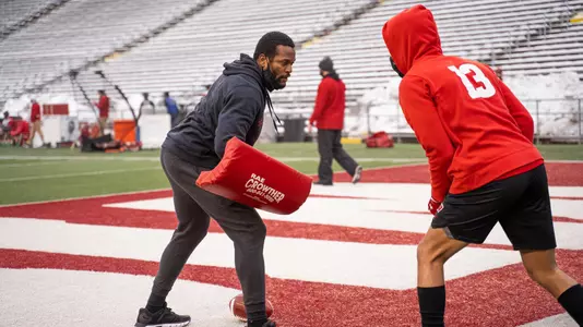Wisconsin wide receivers coach Alvis Whitted training with WR Chimere Dike at spring football practice inside Camp Randall Stadium