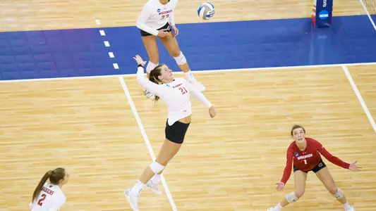 Grace Loberg flies out of the back row for a kill