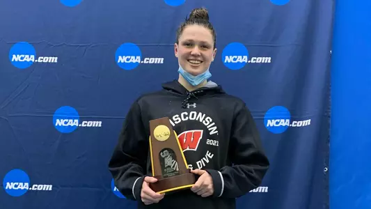 Phoebe Bacon NCAA Championships with NCAA trophy