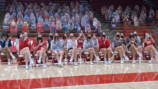 The Badger volleyball team celebrates being named the No. 1 seed.