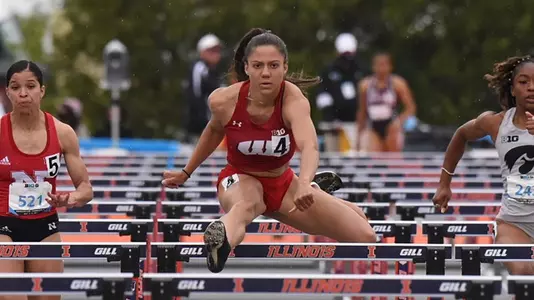 Destiny Huven competes in the 100-meter hurdles.