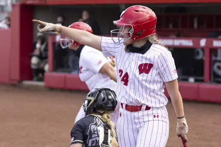 Wisconsin Badgers' Lauren Foster (24) is safe at home during an NCAA softball game against Purdue on Saturday May 16 2021 in Madison, Wisconsin.Photo by Tom Lynn/Wisconsin Athletic Communications
