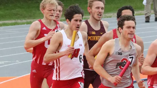 Ansel Fellman kicks off a relay for the Badgers.