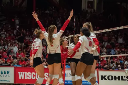 The Badgers celebrate a point on the court vs. TCU
