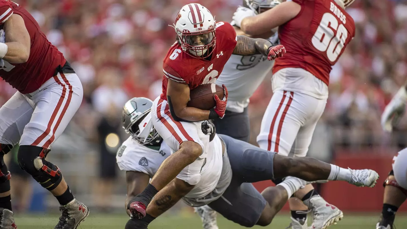 Chez Mellusi, Wisconsin football running back, carries the ball against Eastern Michigan on Saturday, Sept. 11, 2021 at Camp Randall Stadium in Madison, Wisconsin.
