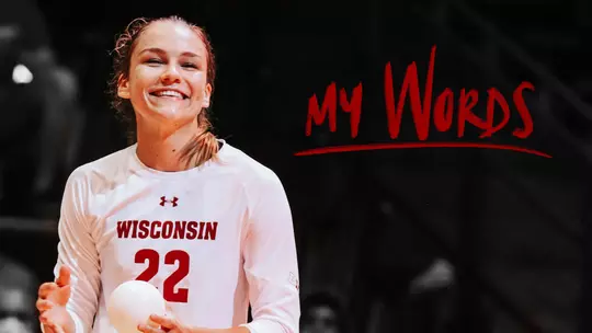 Julia Orzol, Wisconsin volleyball, international student-athlete from Poland with My Words text logo. She's holding a volleyball and smiling.