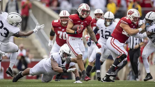 Wisconsin Badgers running back Chez Mellusi (6) carries the ball during a Big Ten Conference NCAA college football game against the Penn State Nittany Lions Saturday, Sept. 4, 2021, in Madison, Wis. The Nittany Lions won 16-10. (Photo by David Stluka/Wisconsin Athletic Communications)