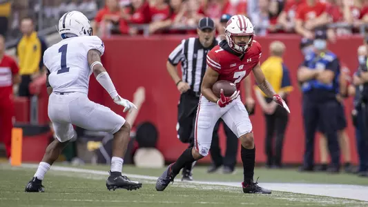 Wisconsin Badgers wide receiver Danny Davis III (7) carries the ball during a Big Ten Conference NCAA college football game against the Penn State Nittany Lions Saturday, Sept. 4, 2021, in Madison, Wis. The Nittany Lions won 16-10. (Photo by David Stluka/Wisconsin Athletic Communications)