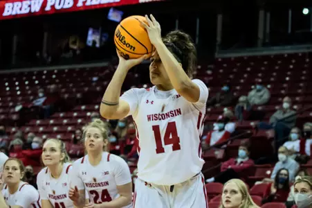 Krystyna Ellew shoots the ball.