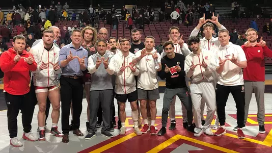 Wisconsin wrestling team photo at Minnesota's Maturi Pavilion after the Badgers defeated the Golden Gophers, 21-15, on the road. It was Wisconsin's first win against Minnesota since the 2010-11 season.