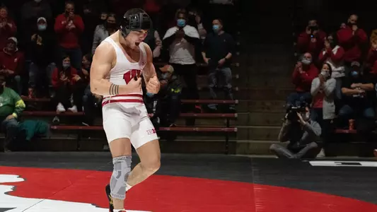 Austin Gomez celebrates after defeating Yahya Thomas (Northwestern) during Wisconsin's Big Ten dual match on Friday, Jan. 7, 2022 at the UW Field House in Madison, Wis. Photo by Jessica Burda Leslie.