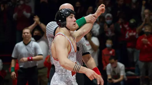 Austin Gomez, Wisconsin wrestling, is declared the winner at 149 pounds vs. Nebraska. No. 8 Gomez earned an upset 4-2 decision win over Nebraska's No. 4 Ridge Lovett at the UW Field House in Madison, Wis.