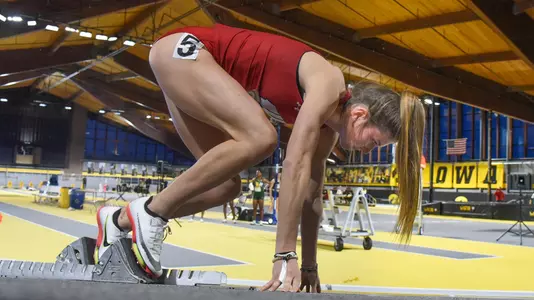 Bianca Stubler leaves the blocks for the start of the 200 meters.
