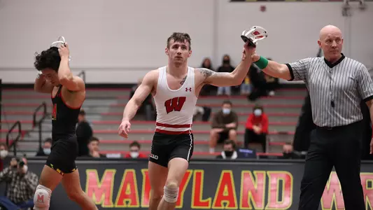 Kyle Burwick, Wisconsin wrestling, is declared the winner at 133 pounds after defeating his Maryland opponent in a Big Ten dual match on Friday, Jan. 28, 2022 at the Xfinitity Center in College Park, Maryland.