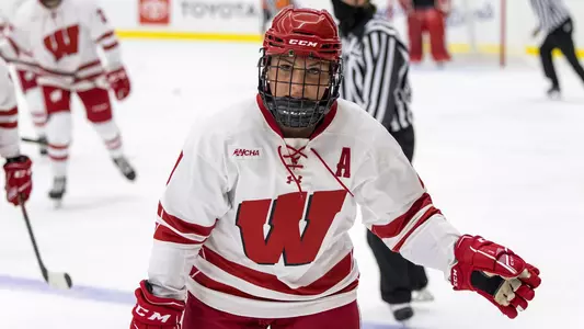 Wisconsin Badgers Nicole Lamantia (21) celebrates a goal during an NCAA women’s college ice hockey game against the Ohio State Buckeyes, Sunday, Oct. 24, 2021, in Madison, Wis. The Badgers won 2-1 in overtime. (Photo by David Stluka/Wisconsin Athletic Communications)