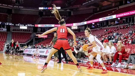 Halle Douglass looks to drive around an Illinois State defender.