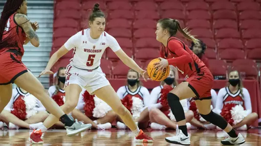 Julie Pospisilova plays defense against an Illinois State player.