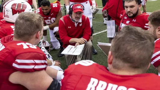 Wisconsin Badgers associated head coach Joe Rudolph talks to the offensive linemen during an NCAA college football game against the Michigan Wolverines, Saturday, Oct. 2, 2021, in Madison, Wis. The Wolverines won 38-17. (Photo by David Stluka/Wisconsin Athletic Communications)