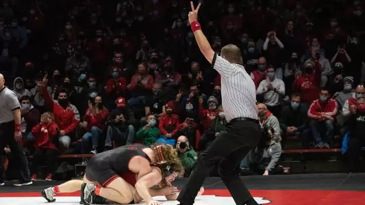 Wisconsin heavyweight Trent Hillger (285 pounds) scores a takedown against Rutgers' Boone McDermott on Sunday, January 9, 2022 in a Big Ten conference wrestling dual match at the UW Field House in Madison, Wis. Wisconsin defeated Rutgers 19-14 and Hillger won 6-3. Photo by Jessica Burda Leslie/Wisconsin Athletics.