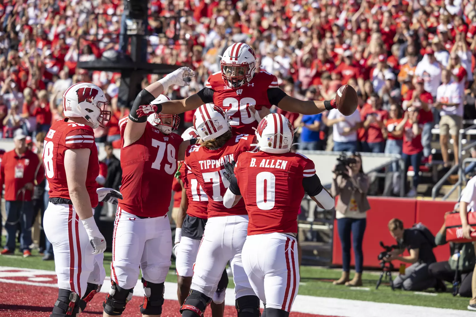 Wisconsin Badgers celebrate a touchdown pass caught by running back Isaac Guerendo during an NCAA college football game against the Illinois Fighting Illini, Saturday, Oct. 1, 2022 in Madison, Wis. (Photo by David Stluka/Wisconsin Athletic Communications)