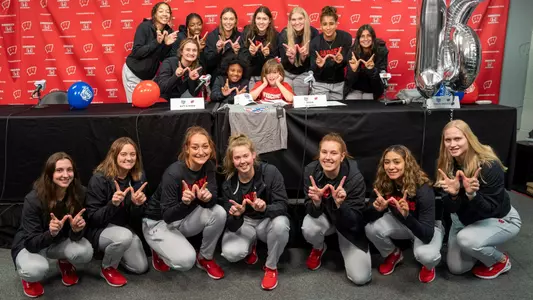 The Wisconsin women's basketball team with Team IMPACT's Emma Morgan