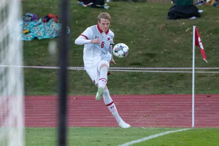 Aron Saevarsson delivers a cross off of a corner kick