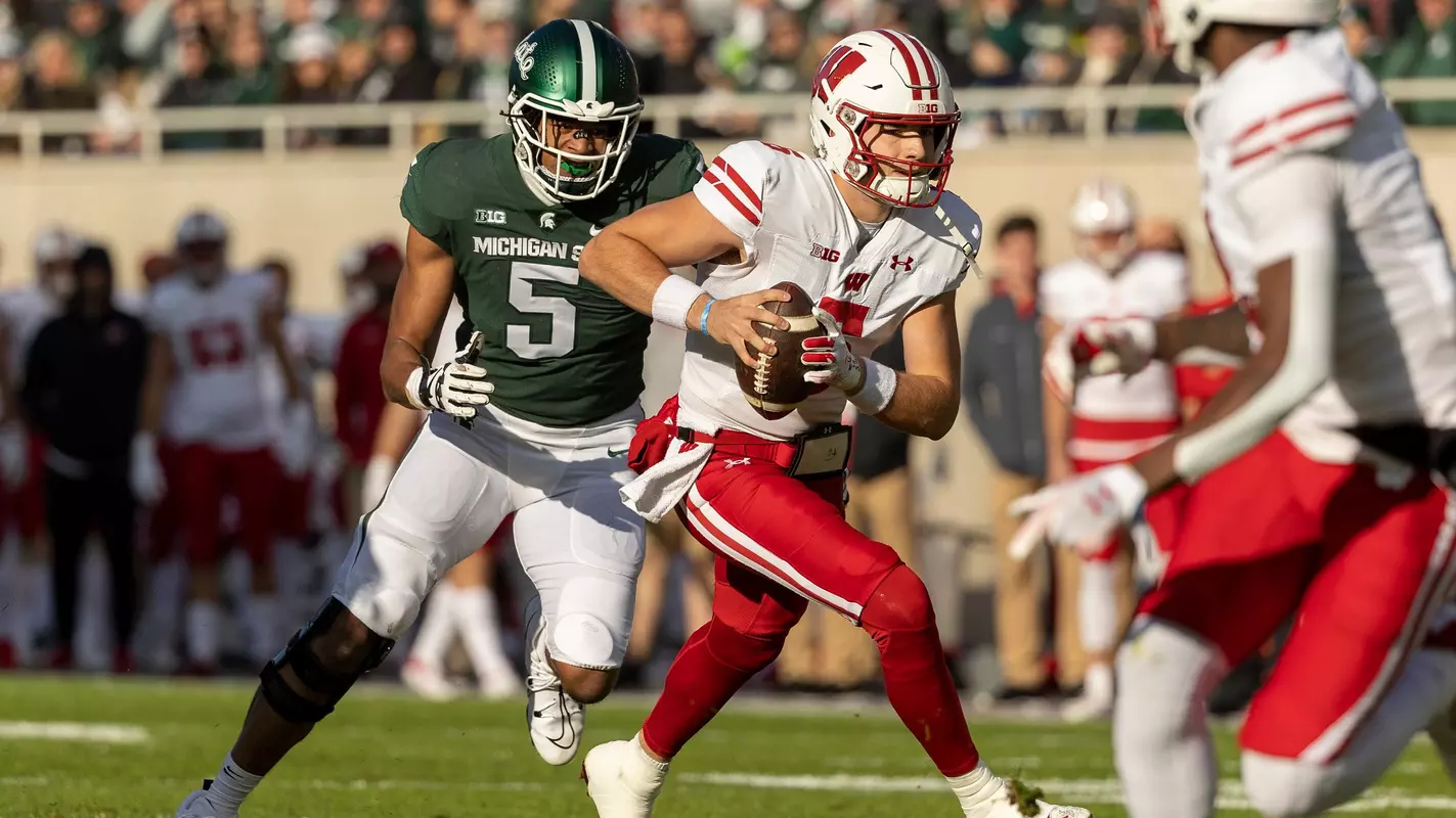 Wisconsin Badgers quarterback Graham Mertz during an NCAA Big Ten Conference college football game against the Michigan State Spartans Saturday, Oct. 15, 2022, in East Lansing, Mich. (Photo by David Stluka/Wisconsin Athletic Communications)