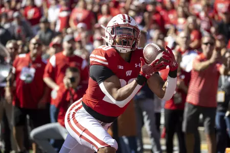 Wisconsin Badgers running back Isaac Guerendo (20) catches a touchdown pass during an NCAA college football game against the Illinois Fighting Illini, Saturday, Oct. 1, 2022 in Madison, Wis. The Illini won 34-10. (Photo by David Stluka/Wisconsin Athletic Communications)