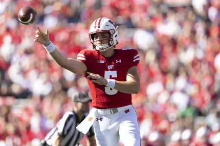 Wisconsin football quarterback Graham Mertz throws the ball as The Wisconsin Badgers face Illinois during an NCAA football game October 1, 2022 in Madison, WI.Photo by Tom Lynn/Wisconsin Athletic Communications