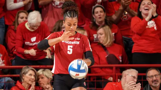 Shanel Bramschreiber gets ready to serve the ball.