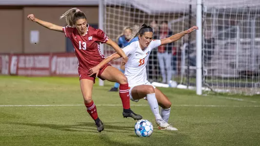 Natalie Viggiano battling with a defender for the ball