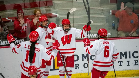 Wisconsin women's hockey celebrates a goal in a WCHA game against Bemidji State at LaBahn Arena on Oct. 20, 2022.