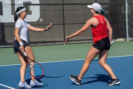 Wisconsin's Cataldi and Seah celebrate during a match