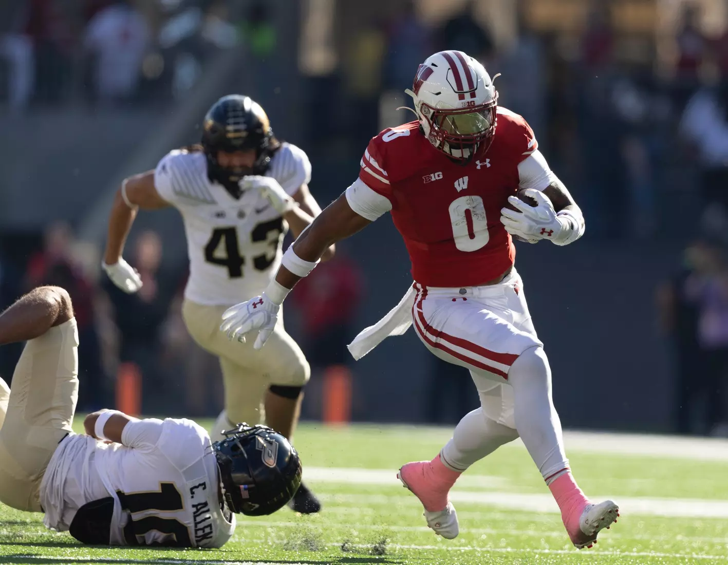 Wisconsin Badgers' running back Braelon Allen (0) getting past the Purdue defense going down field during an NCAA football game against the Purdue Boilmakers on October 22, 2022 in Madison, WI.
