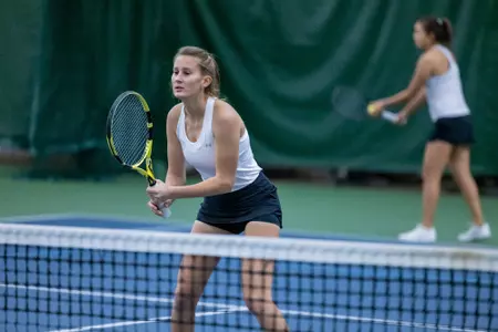 Alina Mukhortova stands at the ready during a serve