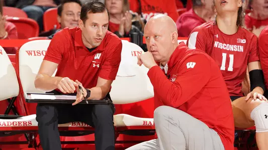 Head coach Kelly Sheffield talks to Associate Head Coach Gary White on the bench.