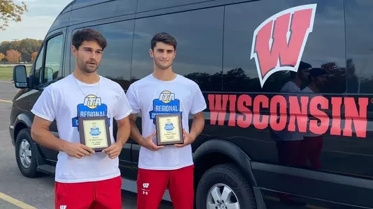 Gabriel Huber and Michael Minasyan with the ITA Regional championship trophies.