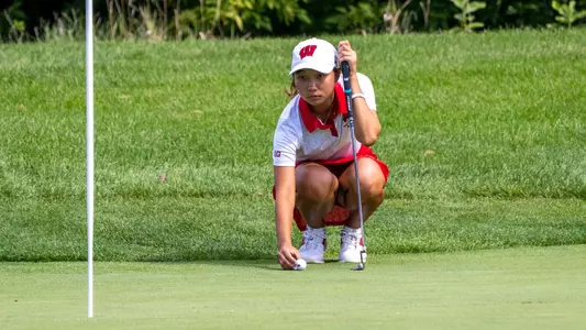 Vanessa Ho of Wisconsin women's golf eyes up a shot at the 2022 Badger Invitational